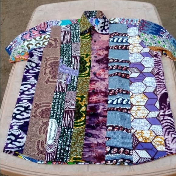 These shirts are made by Didier Adjewodo of Togo, West Africa. - Picture 2 of 6